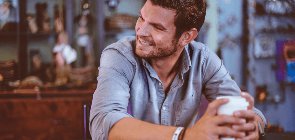 Handsome Man on a Date Holding A Cup of Coffee