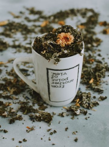 Clear And Unbiased Facts About HERBAL TEAS (Without All the Hype) A white mug filed filled with herbal tea