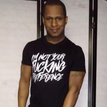 LeNair Xavier, Guest Contributing Author Modeling "Not Your Fucking Preference" tee by Kinkster NYC
