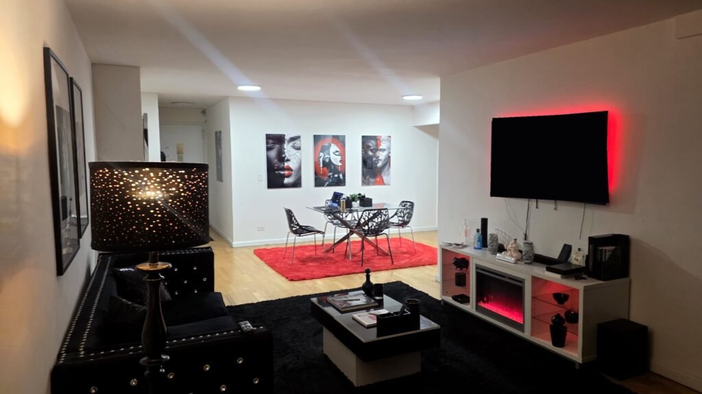 Living room with art by Corey Wesley